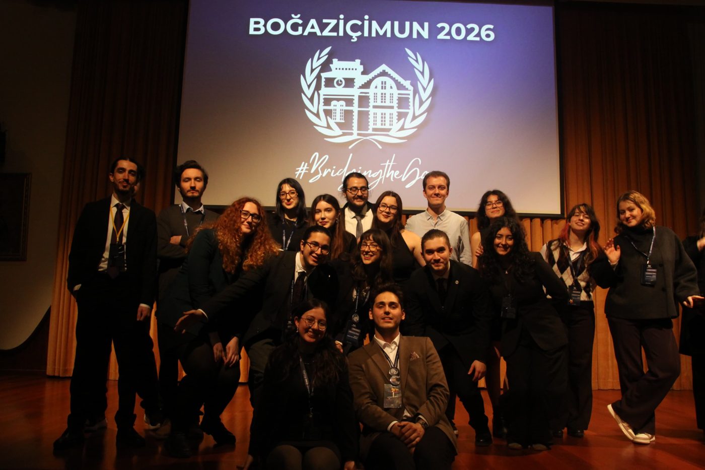 The BoğaziçiMUN 2026 team together on the Albert Long Hall stage