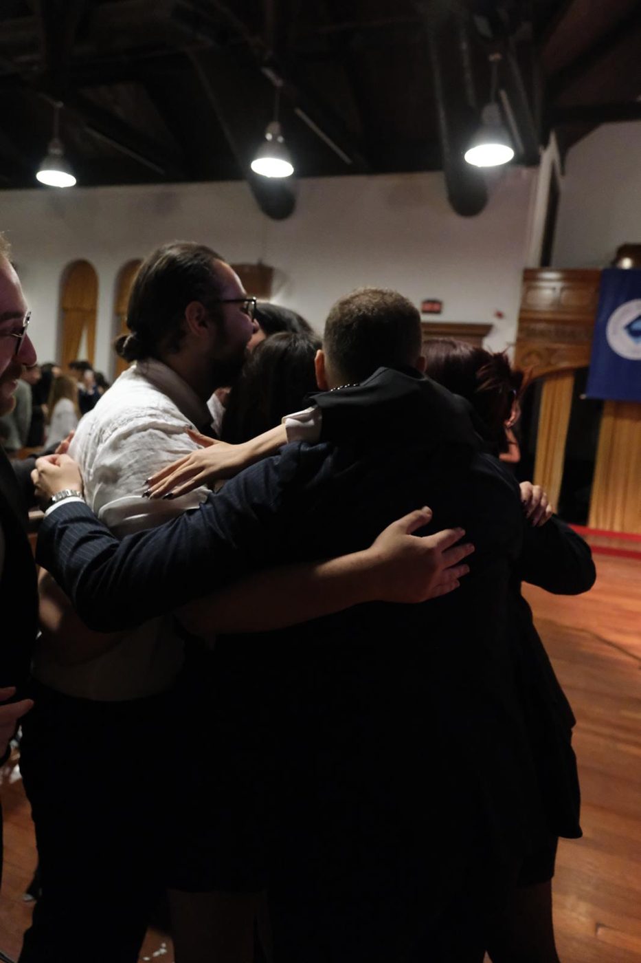 Team members in a group hug at the end of BoğaziçiMUN Advanced 2025